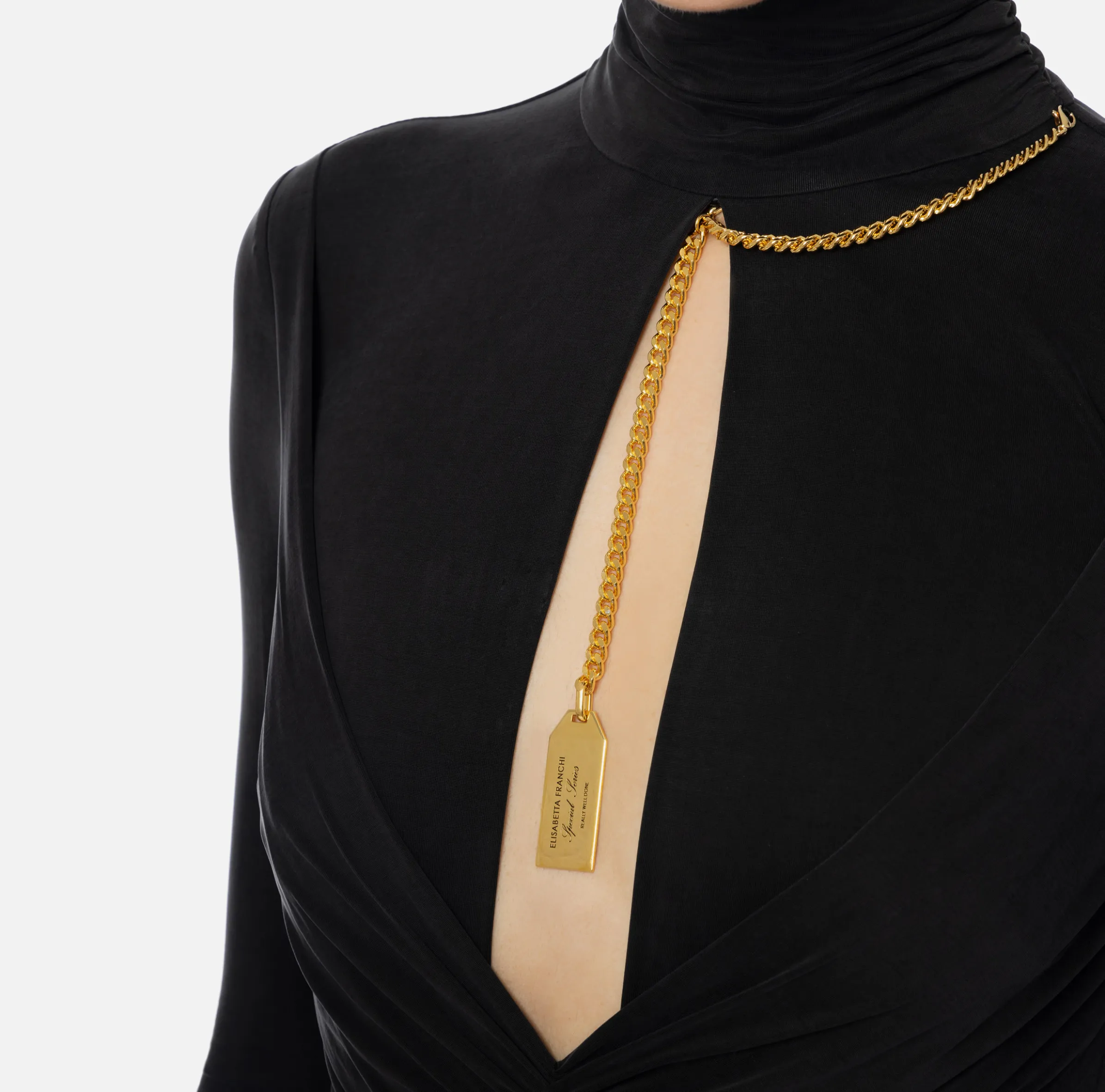 Abito red carpet in jersey drappeggiato con collana
