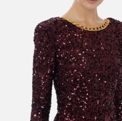 Abito red carpet in paillettes con catena e strass