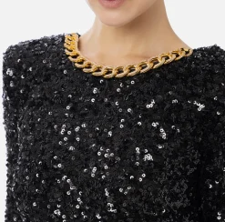 Abito red carpet in paillettes con catena e strass