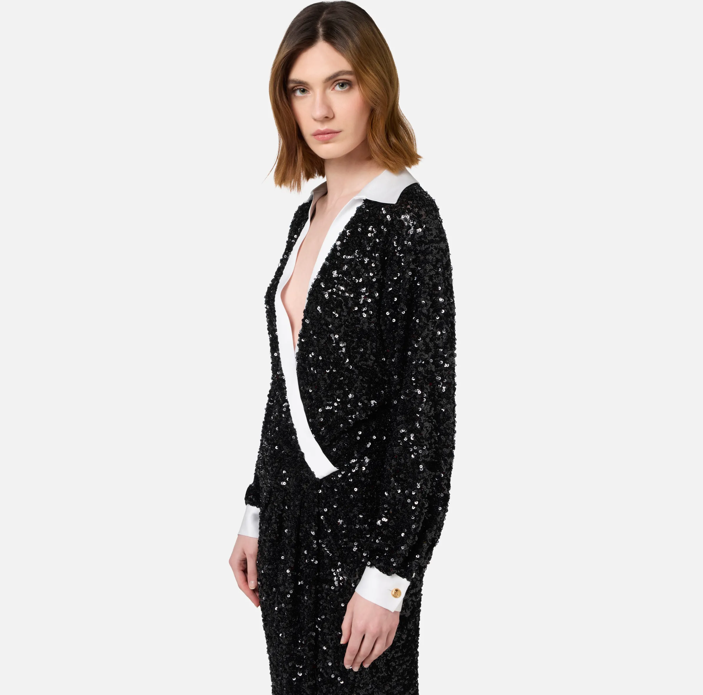 Abito red carpet in paillettes con inserti in raso