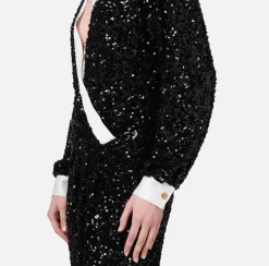 Abito red carpet in paillettes con inserti in raso