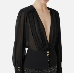 Blusa in georgette con baschina
