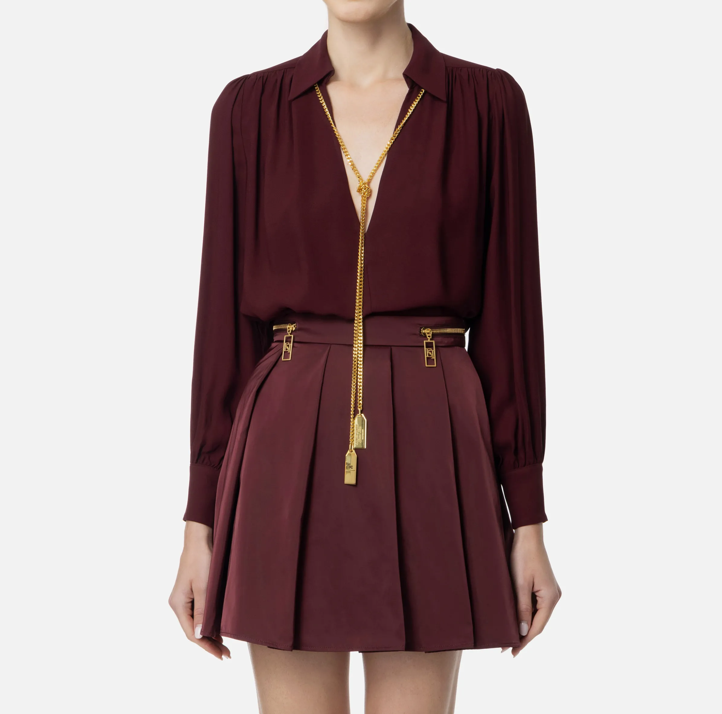 Blusa in georgette con charms collana