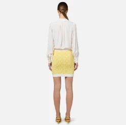 Blusa in georgette con charms collana