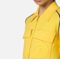 Bomber in viscosa con patch logo