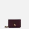 Borsa a tracolla in materiale sintetico con placca logo