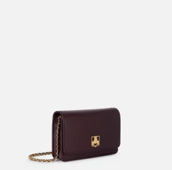 Borsa a tracolla in materiale sintetico con placca logo