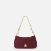 Borsa hobo in tessuto con tracolla charms
