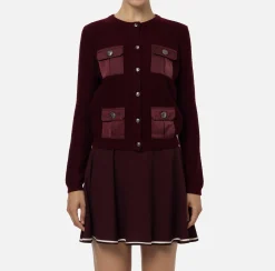 Cardigan in lana bouclé con tasche in vela tecnica
