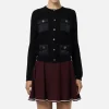 Cardigan in lana bouclé con tasche in vela tecnica