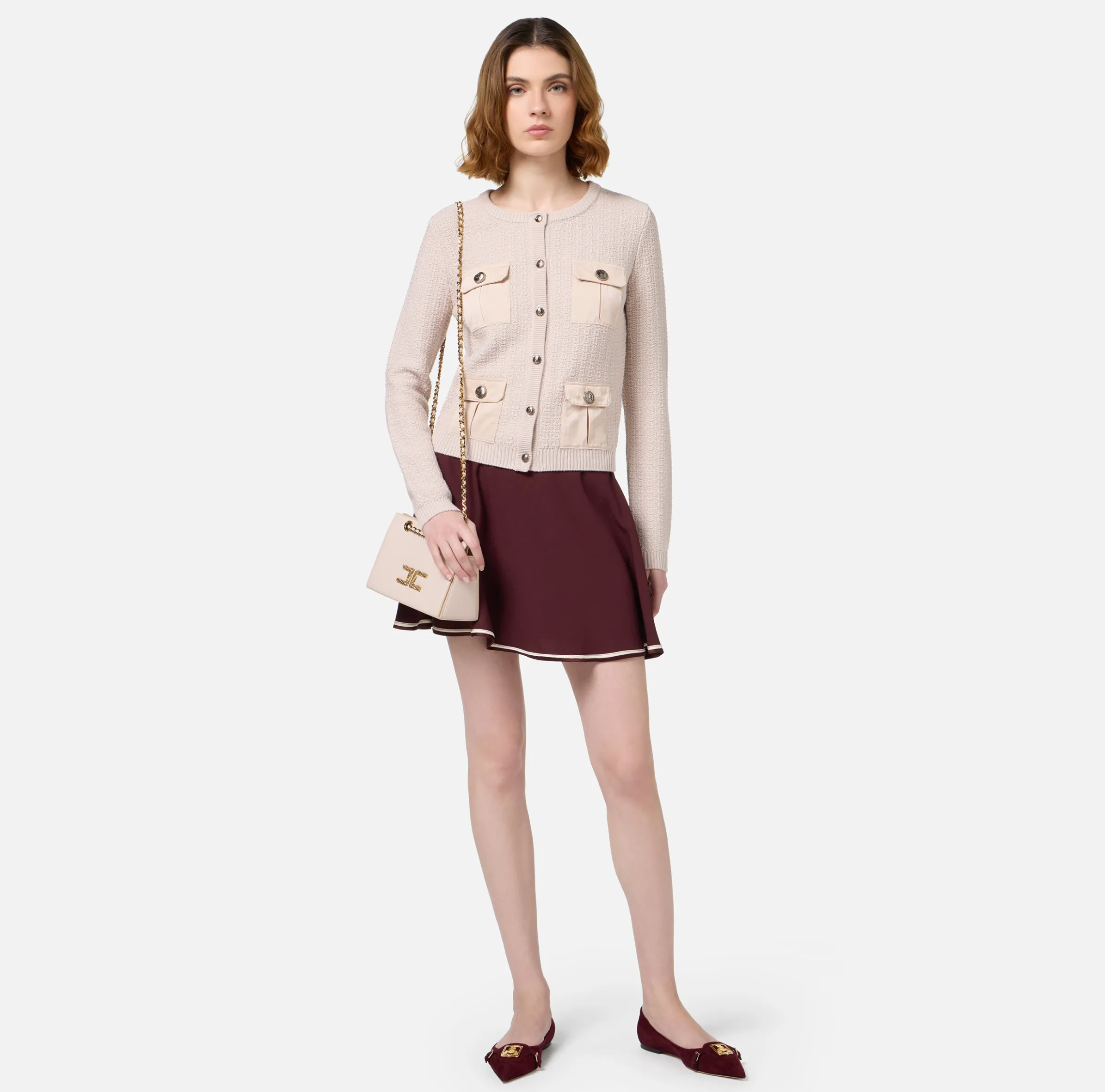 Cardigan in lana bouclé con tasche in vela tecnica