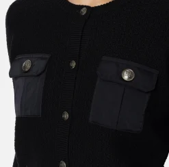 Cardigan in lana bouclé con tasche in vela tecnica