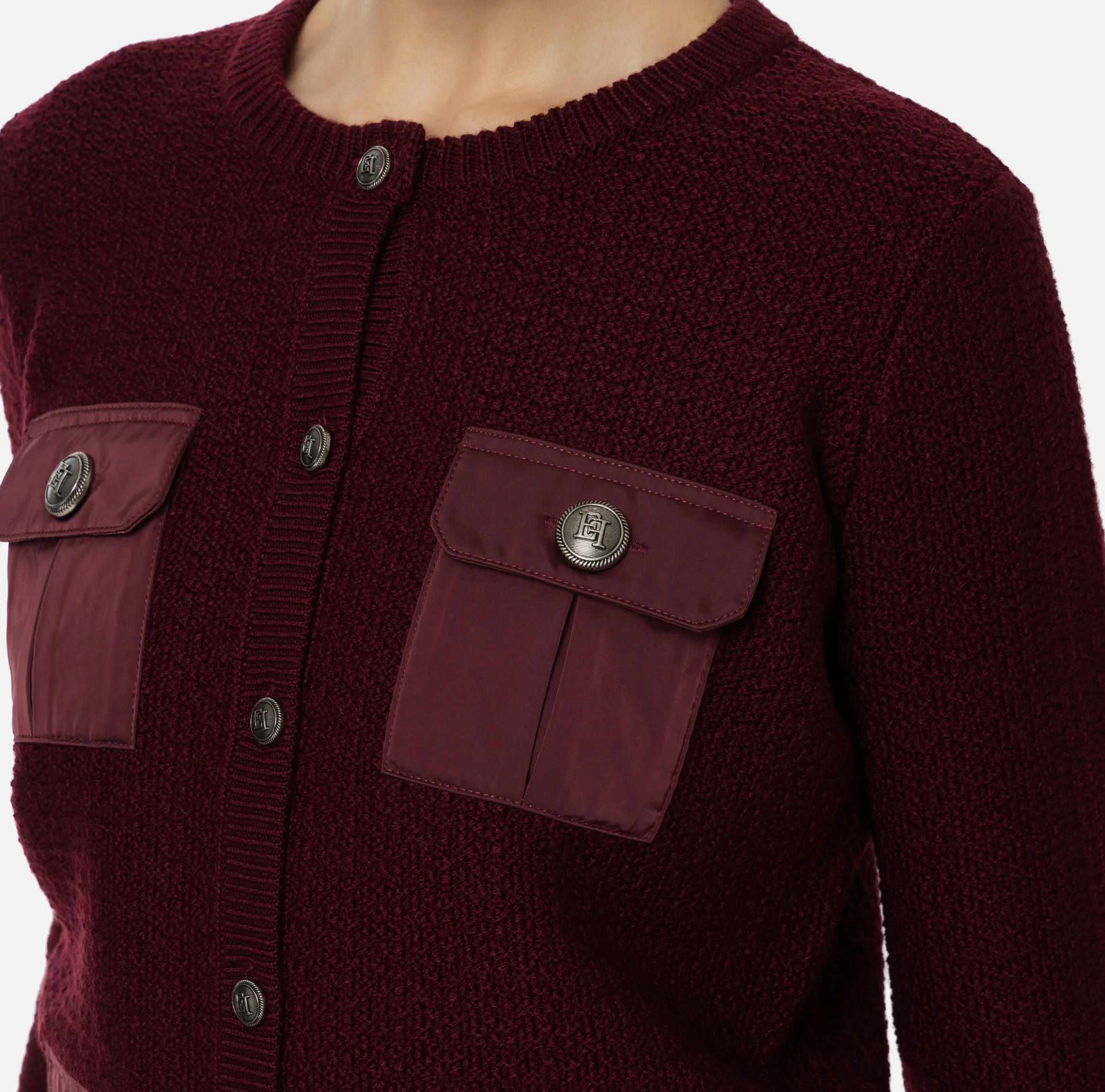 Cardigan in lana bouclé con tasche in vela tecnica