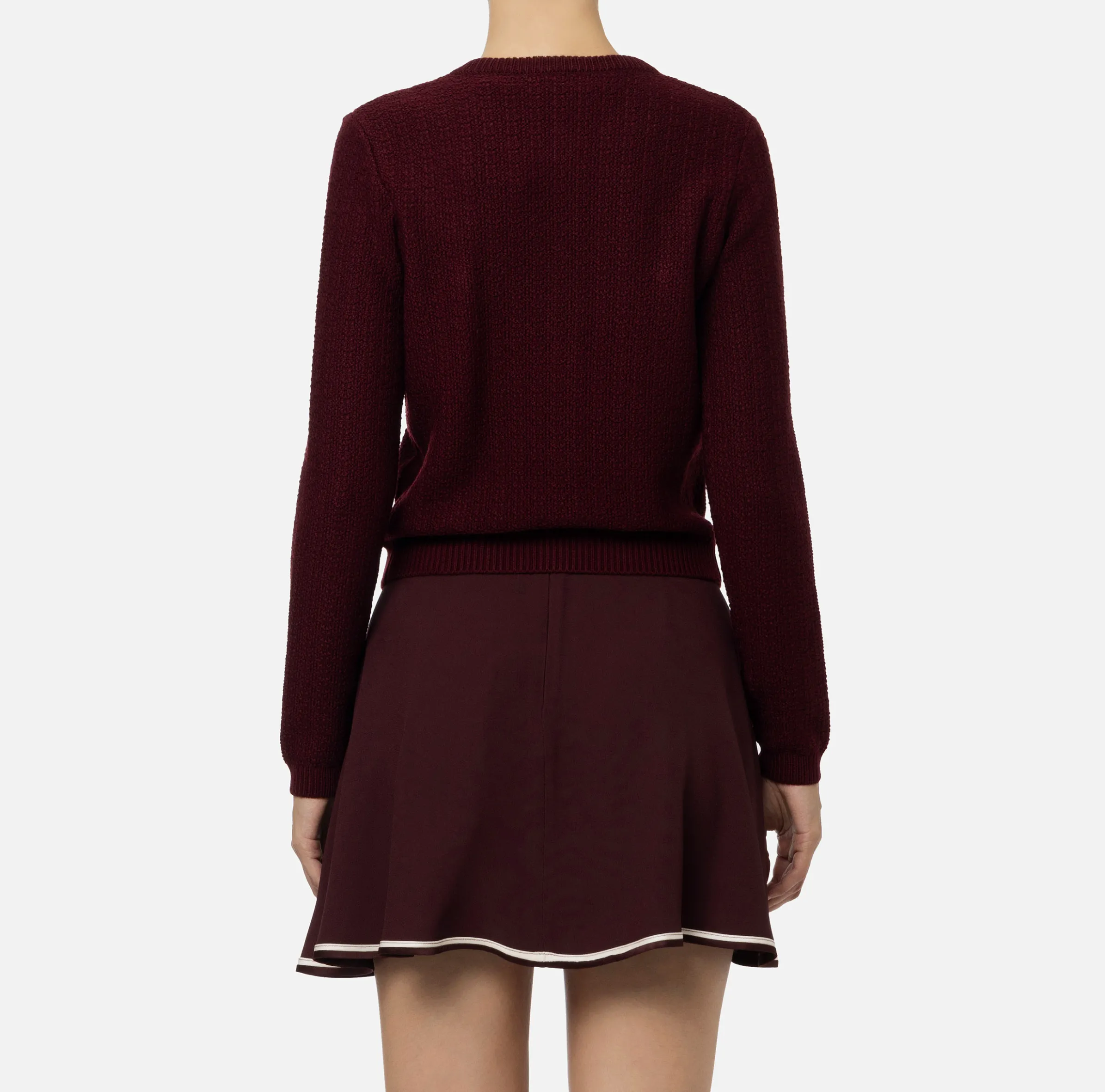 Cardigan in lana bouclé con tasche in vela tecnica