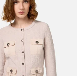 Cardigan in lana bouclé con tasche in vela tecnica