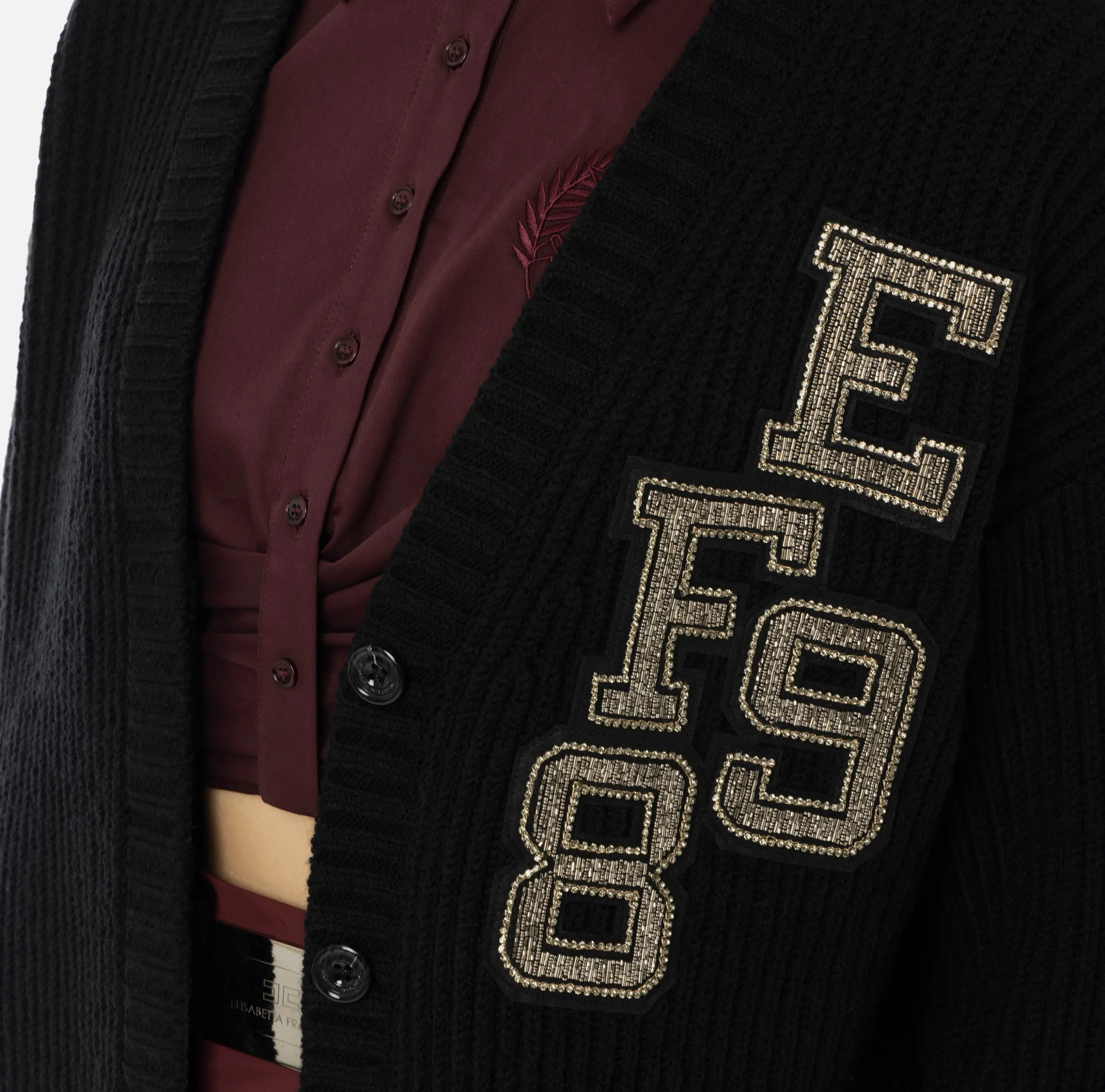 Cardigan in lana costa inglese con patch logo