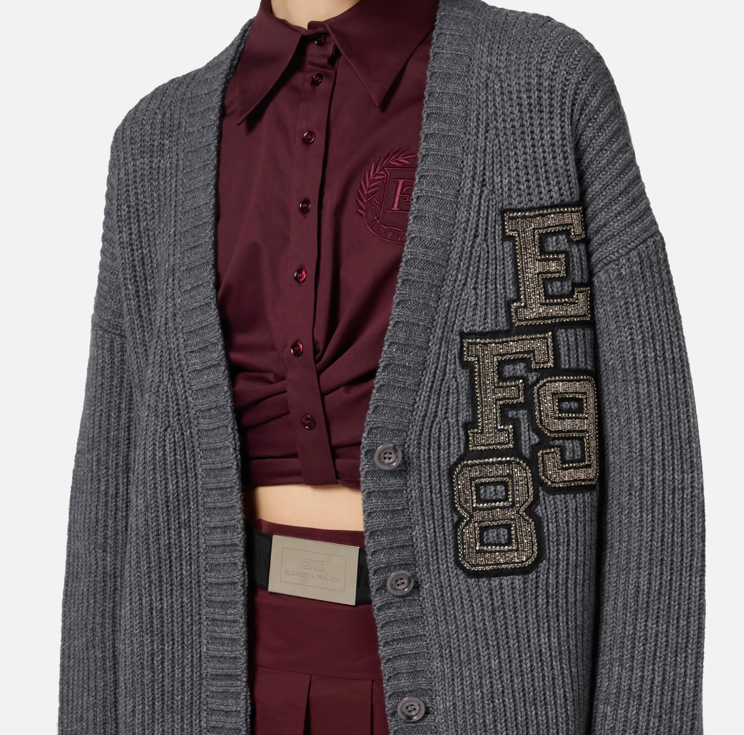 Cardigan in lana costa inglese con patch logo