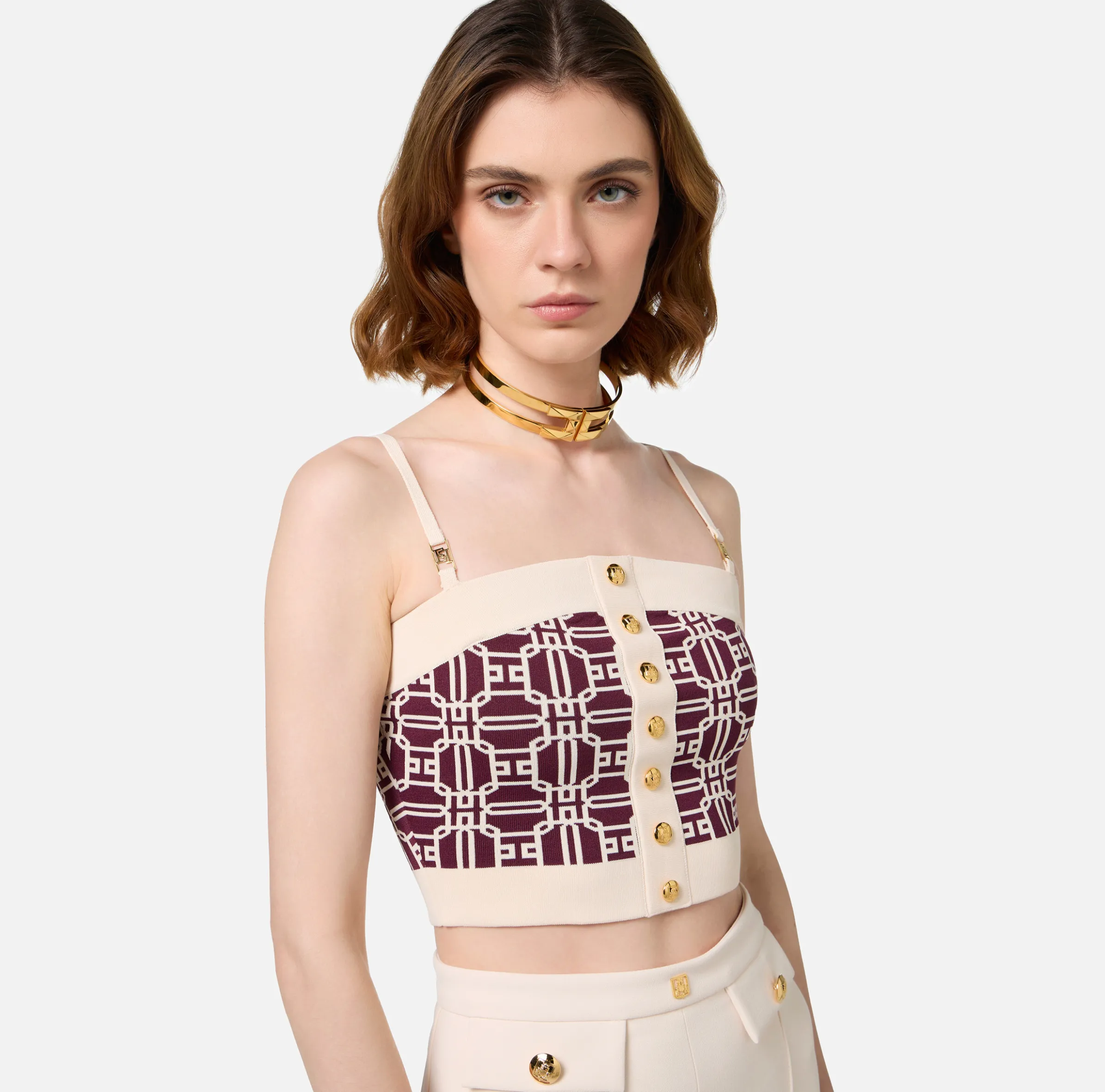 Collana choker rigida in metallo dorato