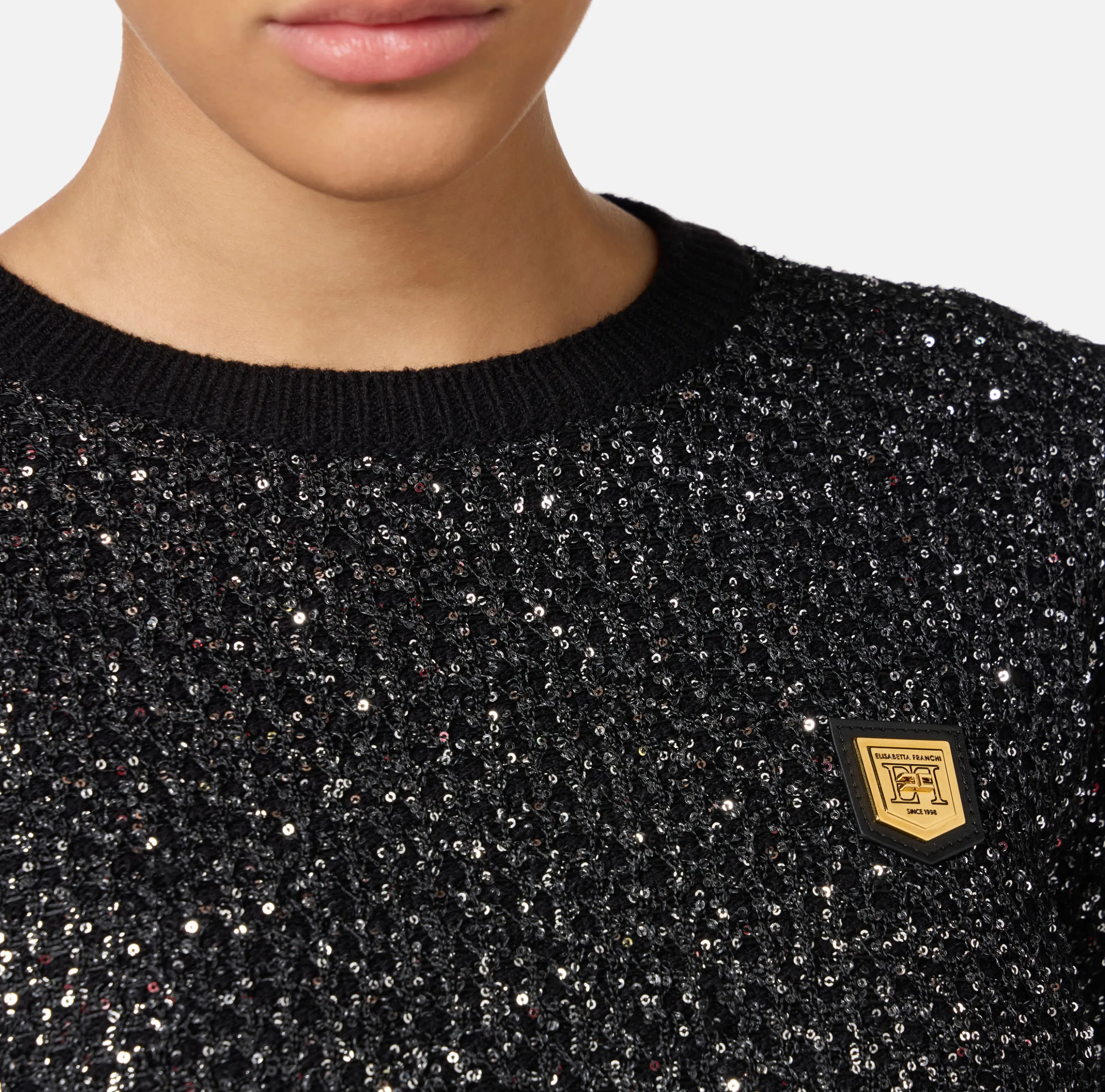 Crop top in lana con filo paillettes