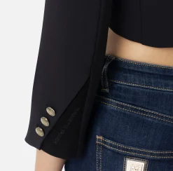Giacca cropped in crêpe con revers in raso