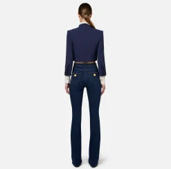 Giacca cropped in crêpe con revers in raso