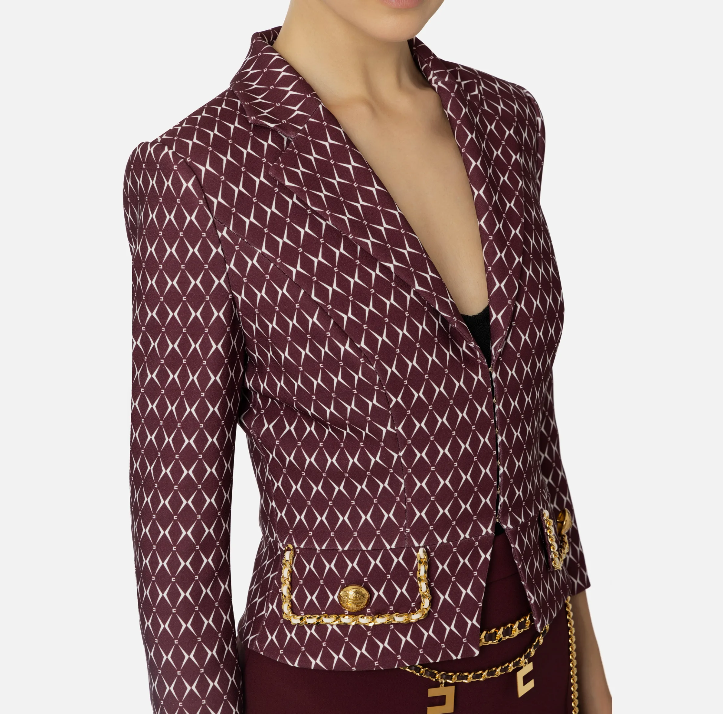 Giacca cropped in crêpe stretch stampa rombo con catena