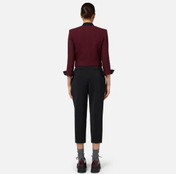 Giacca cropped in tweed laminato con tasche
