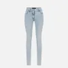 Jeans skinny in cotone stretch con placca logo