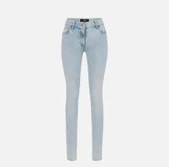 Jeans skinny in cotone stretch con placca logo