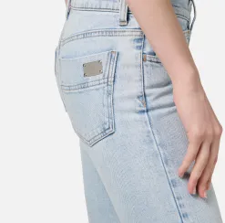 Jeans skinny in cotone stretch con placca logo