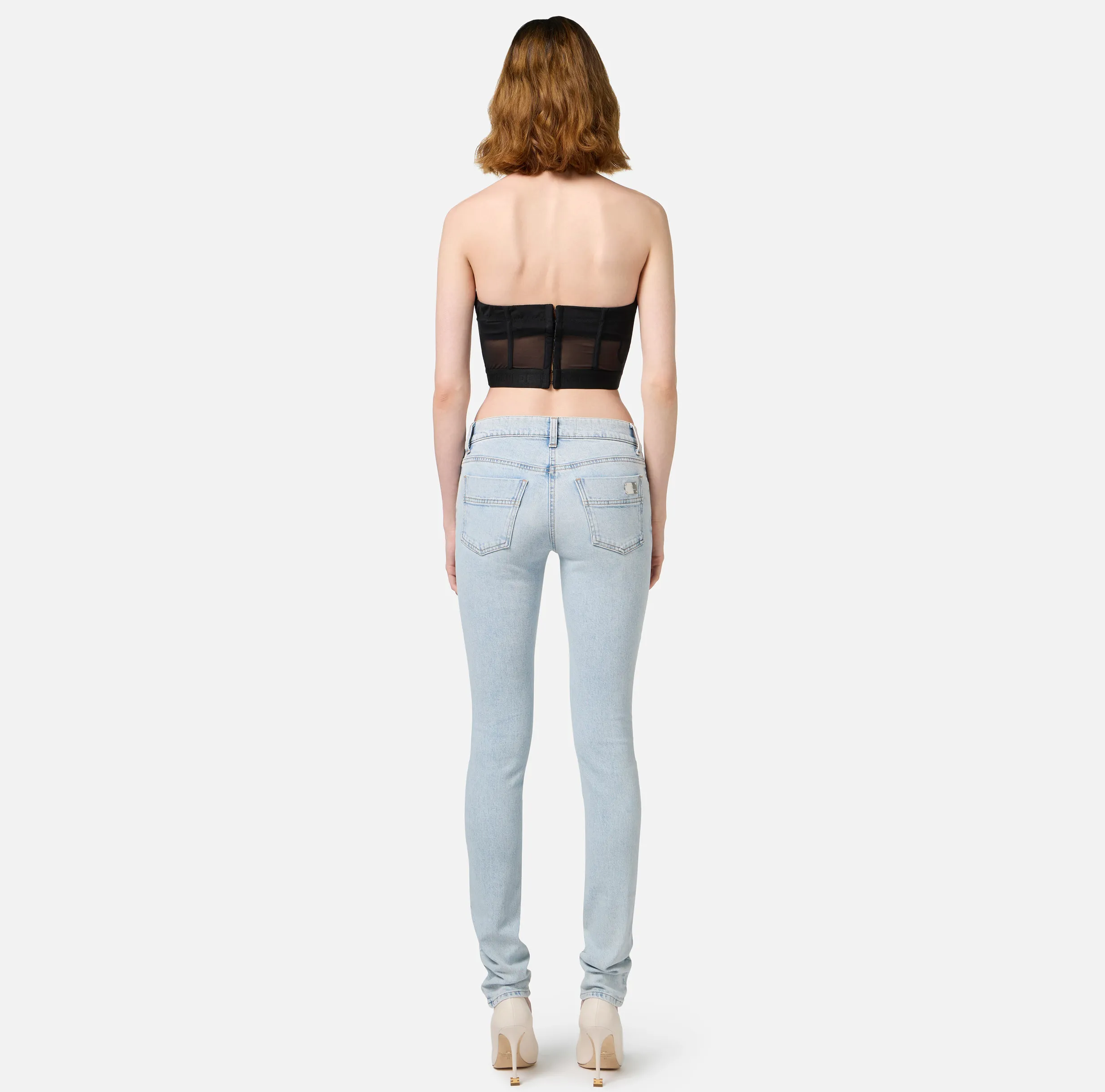 Jeans skinny in cotone stretch con placca logo