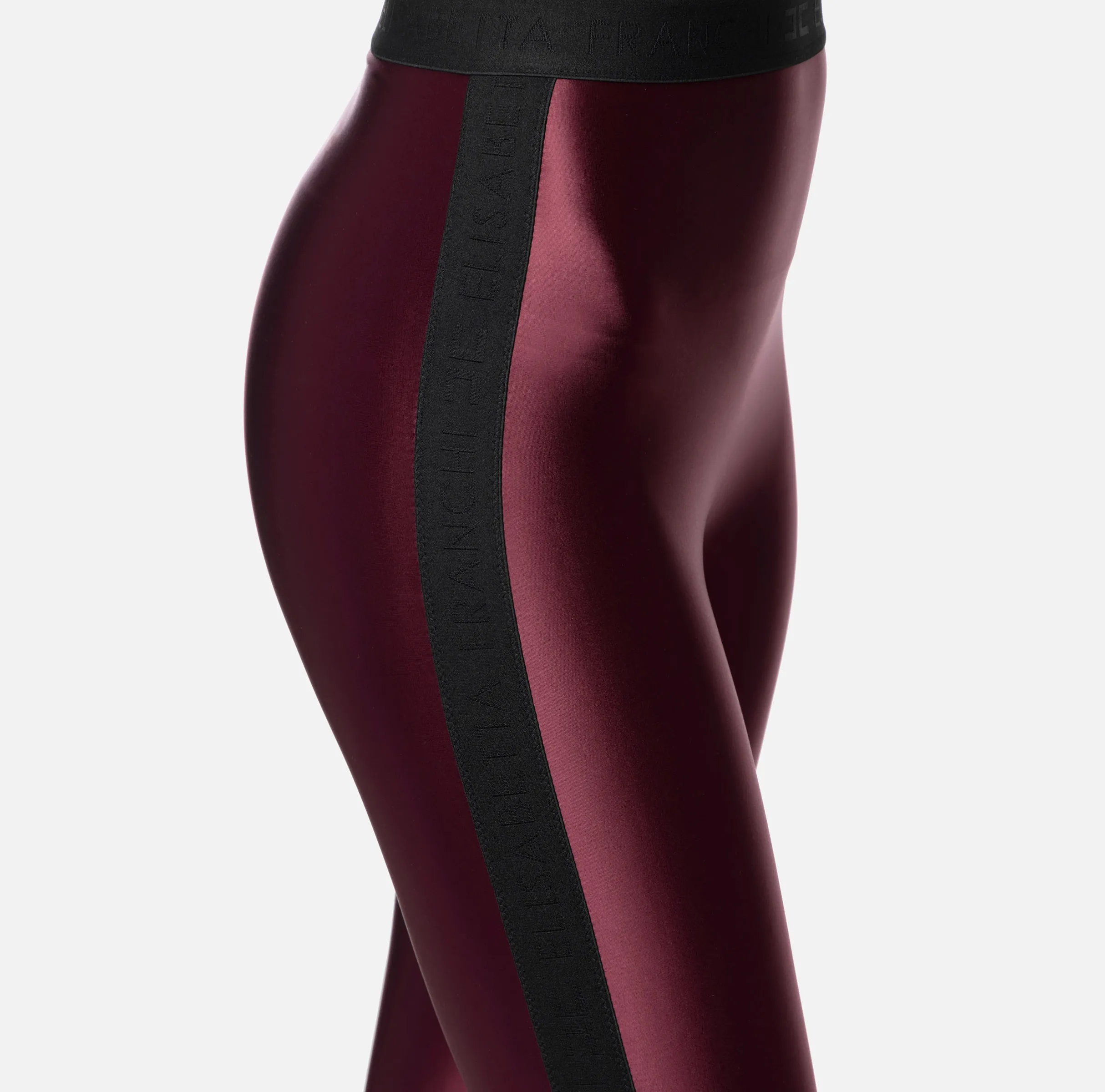 Leggings in lycra lucida con elastico logato