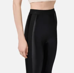 Leggings in lycra lucida con elastico logato