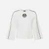Maglia cropped in viscosa con patch logo