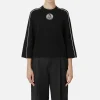 Maglia cropped in viscosa con patch logo