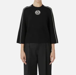 Maglia cropped in viscosa con patch logo