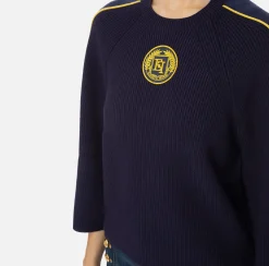 Maglia cropped in viscosa con patch logo