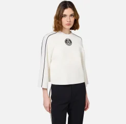 Maglia cropped in viscosa con patch logo