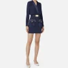 Miniabito con camicia incrociata e gonna con tasche