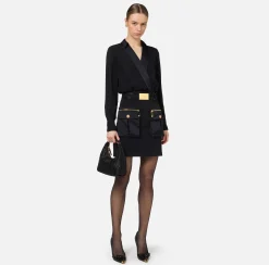 Miniabito con camicia incrociata e gonna con tasche