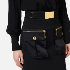 Miniabito con camicia incrociata e gonna con tasche