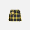 Minigonna a pieghe in lana tartan con patch ricamato