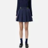 Minigonna a pieghe in nylon tecnico con zip