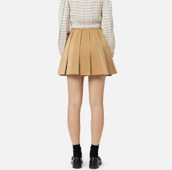 Minigonna a pieghe in nylon tecnico con zip