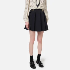 Minigonna a pieghe in nylon tecnico con zip
