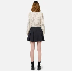 Minigonna a pieghe in nylon tecnico con zip