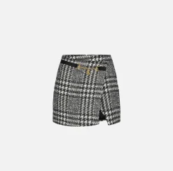 Minigonna a portafoglio in tweed laminato