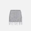 Minigonna in tulle ricamata con frange di paillettes