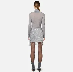 Minigonna in tulle ricamata con frange di paillettes