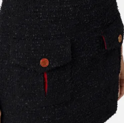 Minigonna in tweed con tasche